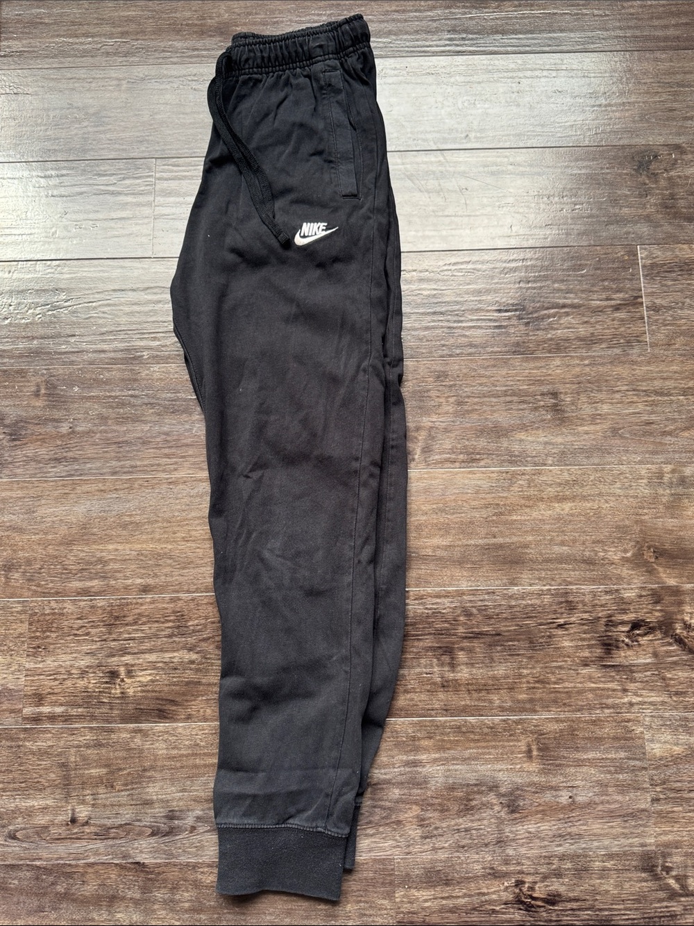 Nike Black Sweatpants with White Swoosh Logo